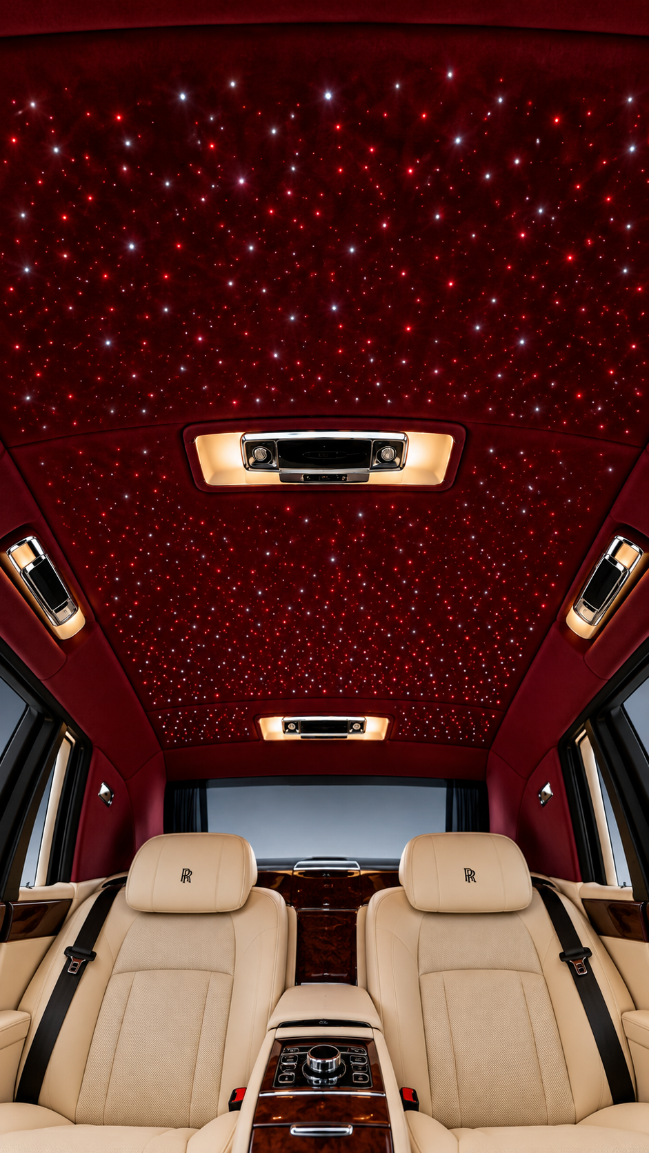 Burgundy starlight headliner over a Rolls-Royce cabin
